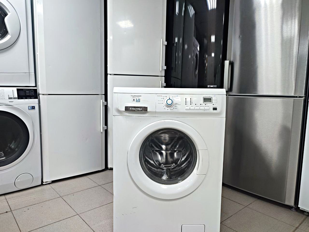 Купить стиральную машину бу в СПб Electrolux EWF147410W 7кг. 1400об/мин.